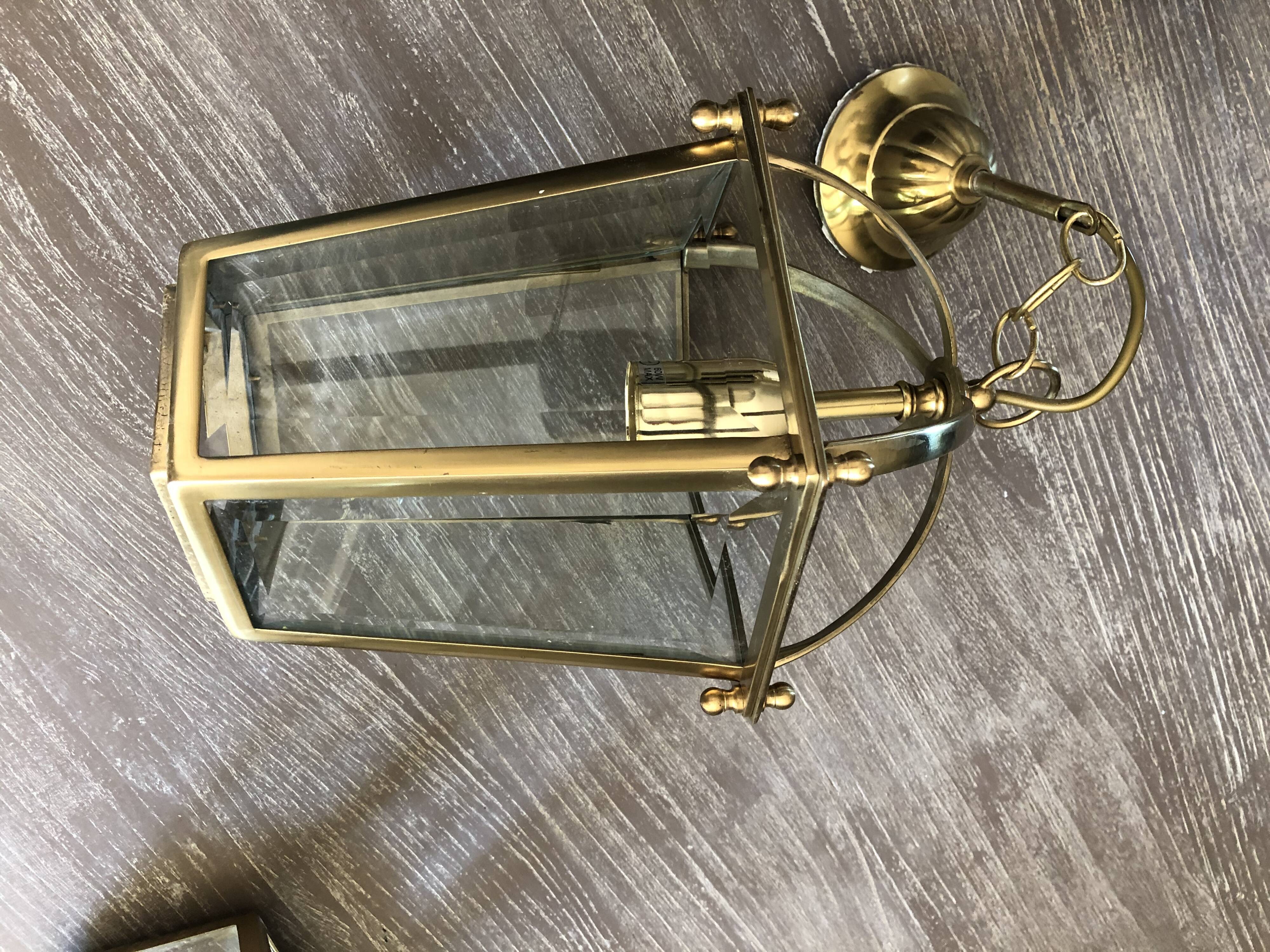 Brass lantern lamps and glass