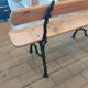 Antique garden bench with cast iron legs