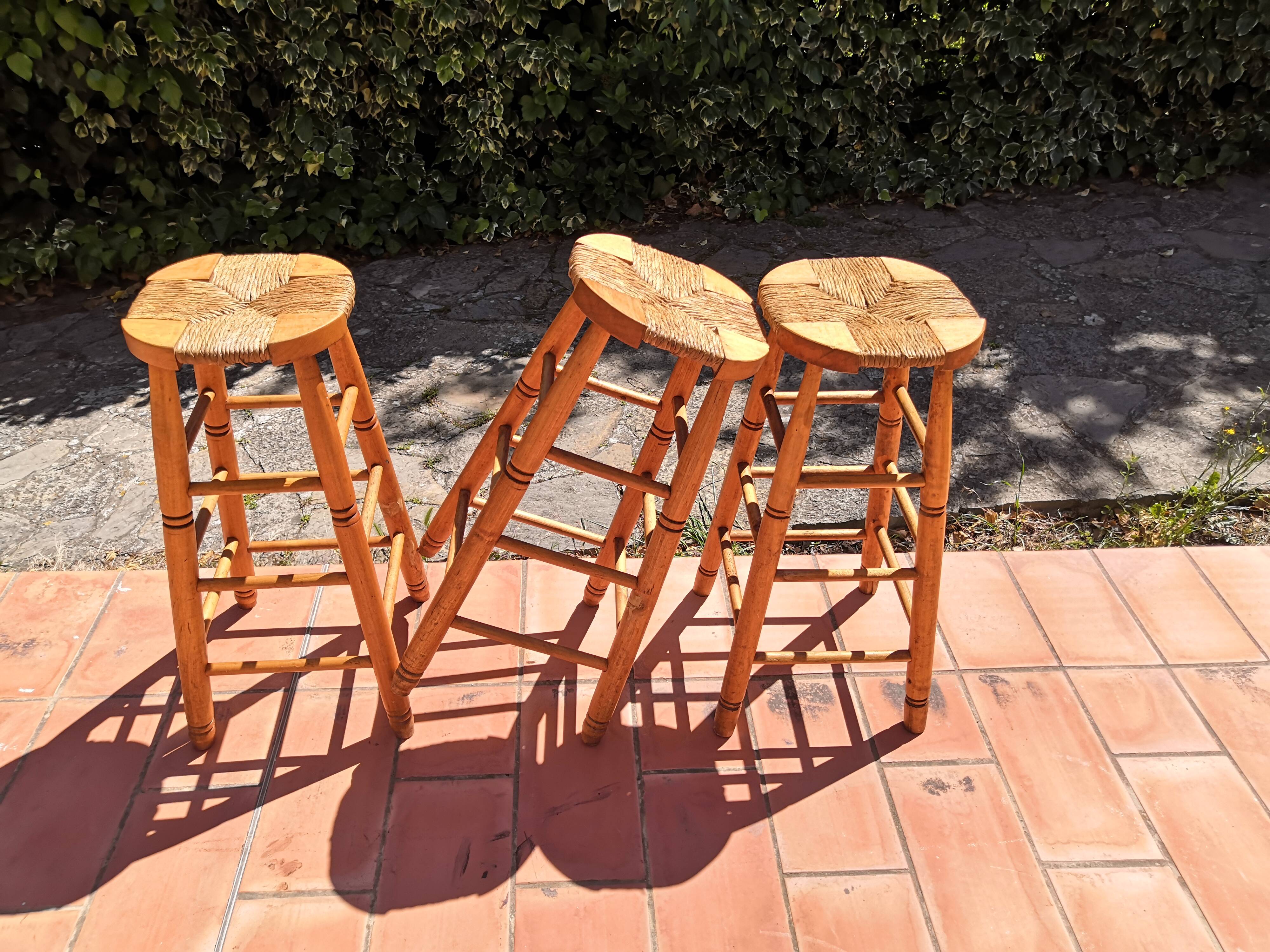 Set of 3 high “modernist” straw stools vintage 1950s