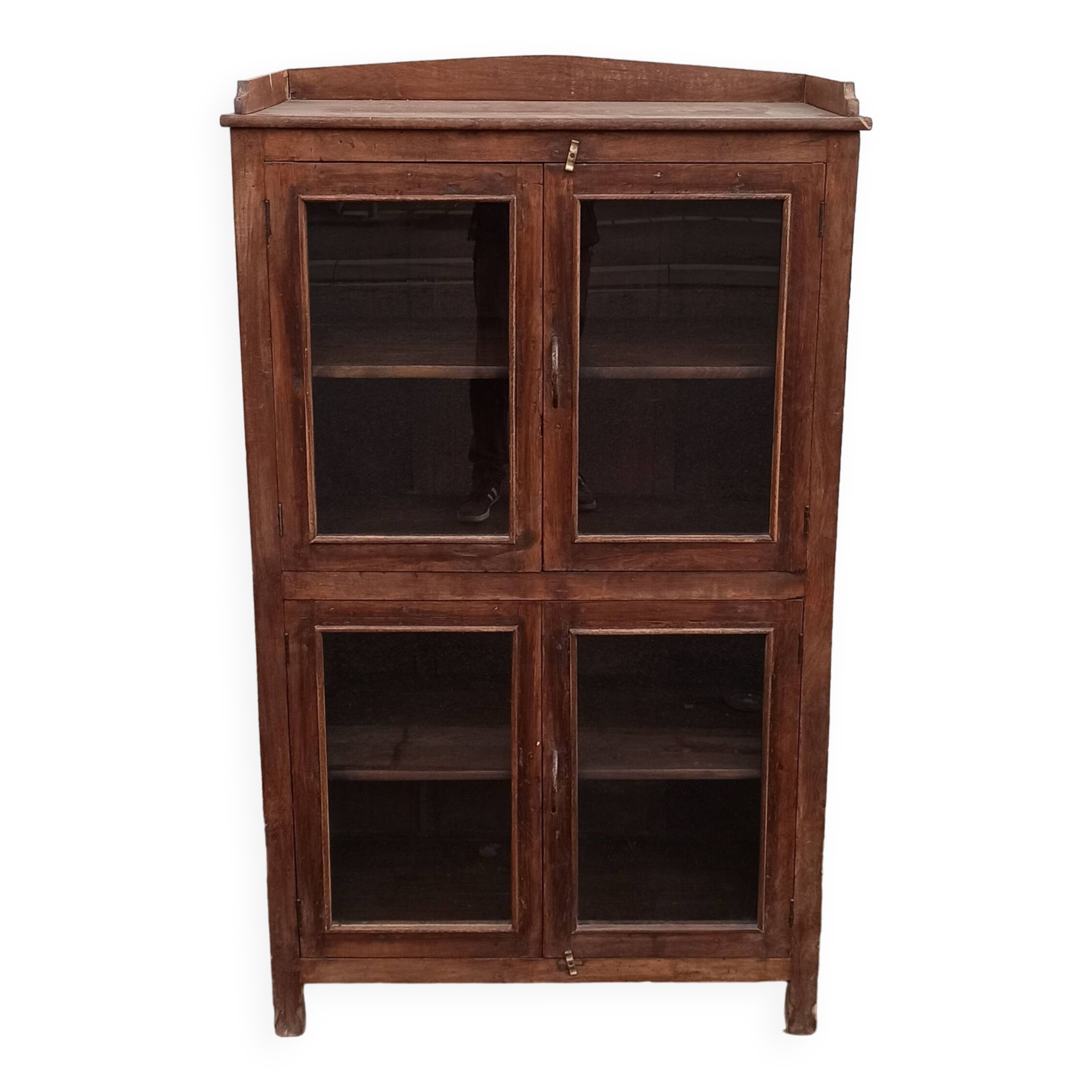 Old wooden glazed cabinet with four doors