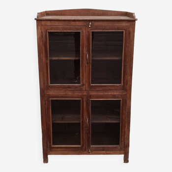 Old wooden glazed cabinet with four doors