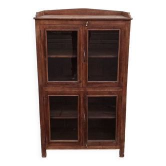 Old wooden glazed cabinet with four doors