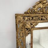 Miroir a pare closes de style Louis XIV en bois et stuc doré XIX siècle