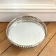 Openwork metal round mirror top