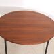 Expandable round dining table