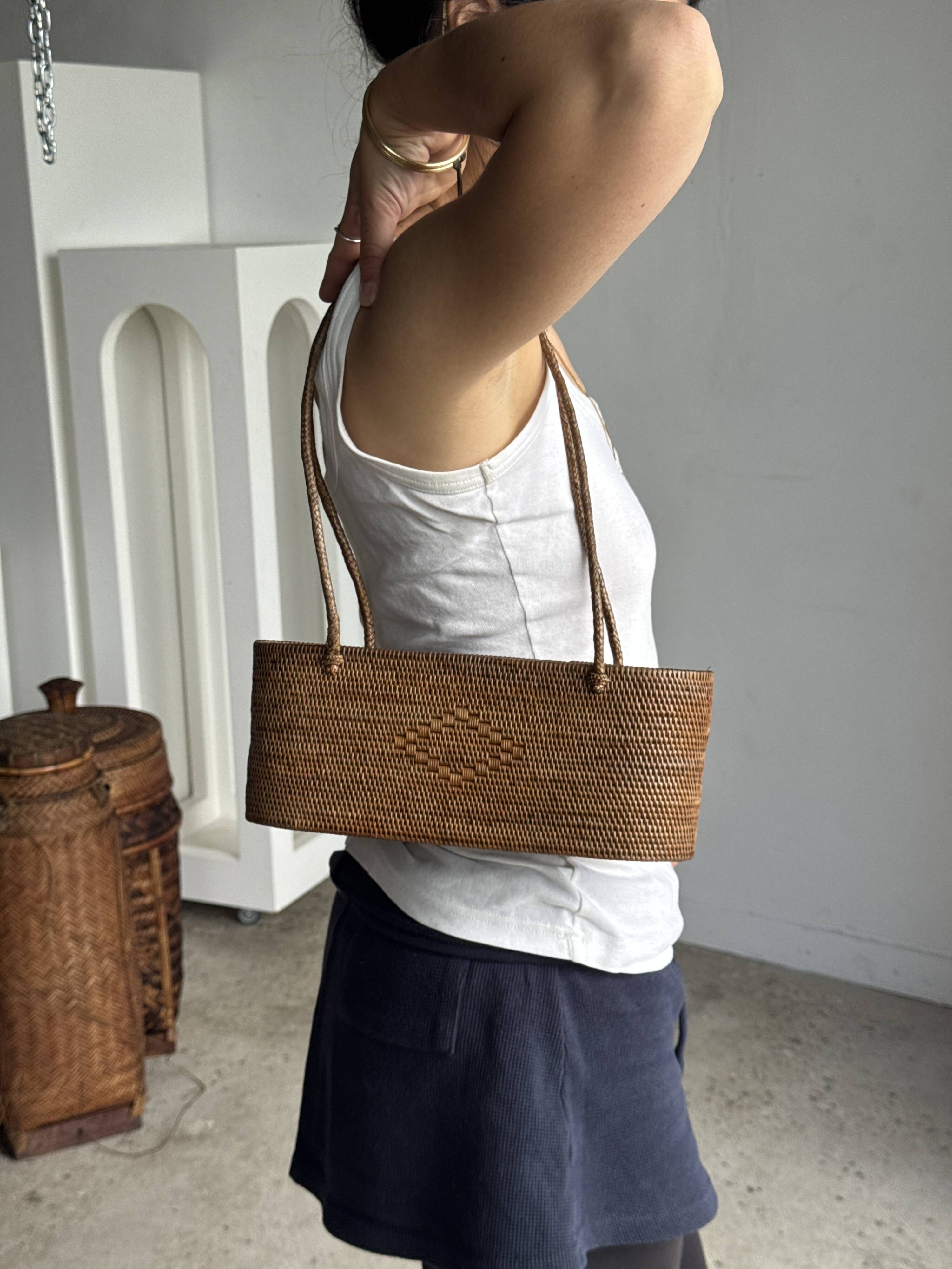 Small oval basket with long handles, traditional Indonesian L28xH10