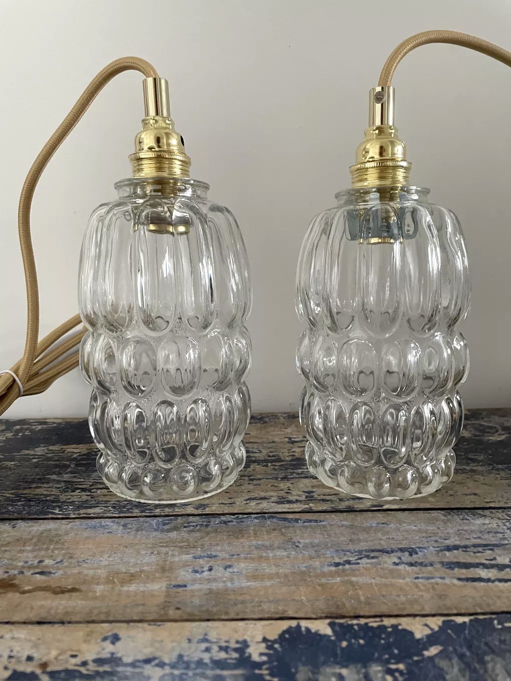 Set of two vintage electric chiseled glass walking lamps