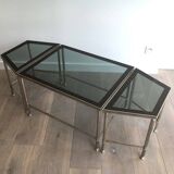 Rare three-part nickel coffee table with lacquered glass tops around the perimeter