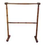 Turned wooden towel rack