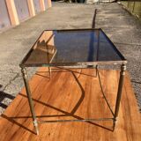 Brass side table with smoked glass.