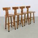 Lot de 4 tabourets de bar vintage en bois