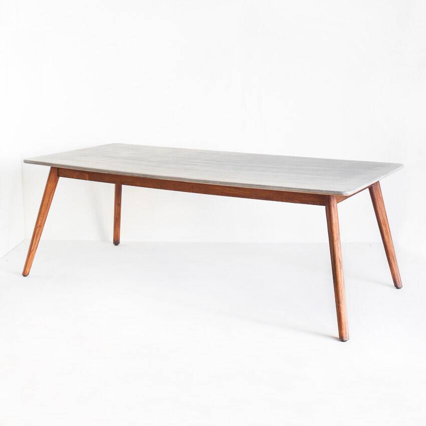 Scandinavian style dining table. Polished and varnished wood and concrete. For indoor or outdoor use.