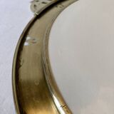 Art Nouveau plate in earthenware with a brass frame