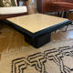 Coffee table in lacquered wood and vintage travertine