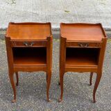 2 Louis XV bedside tables made of curved solid wood with drawers.