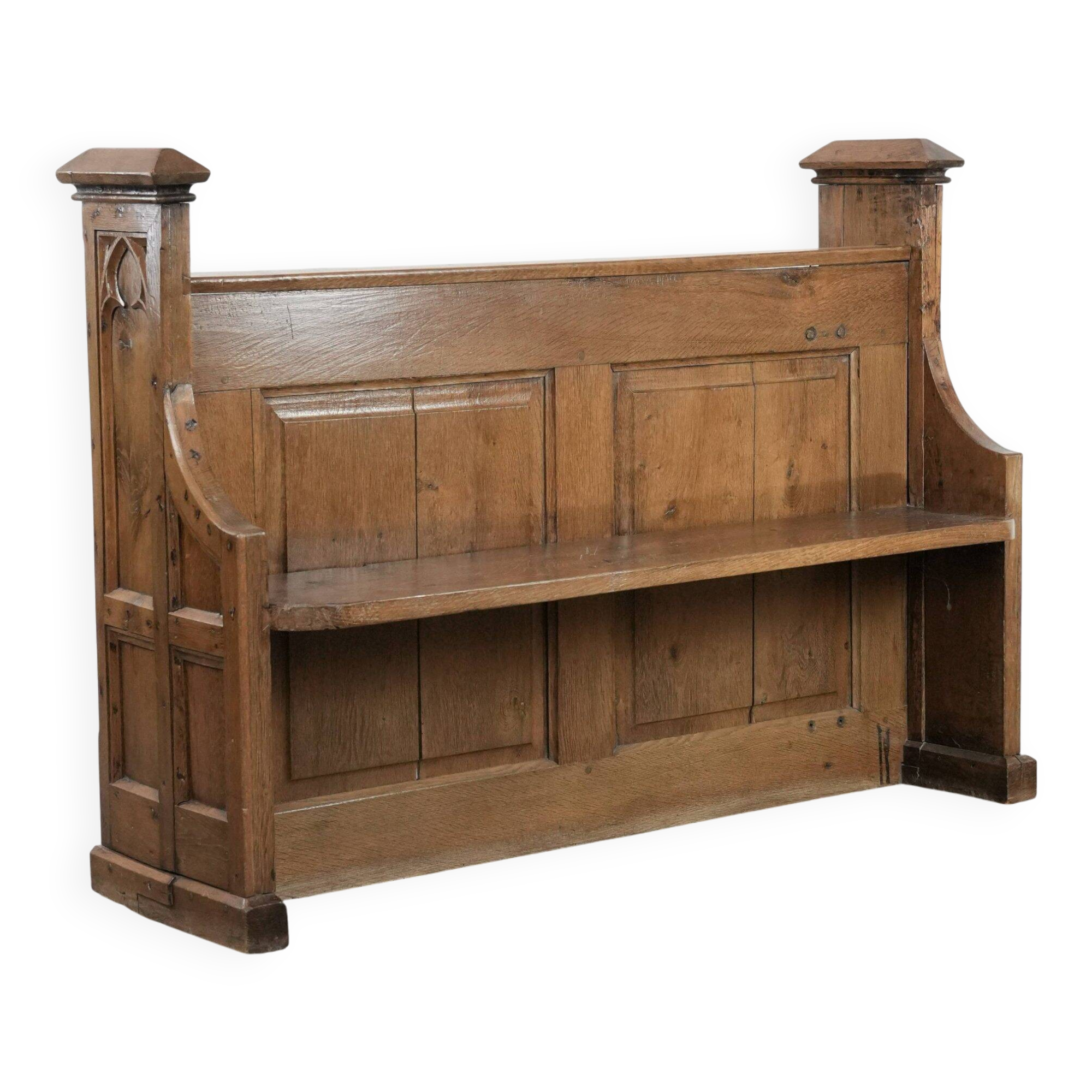 Antique oak church bench in Gothic style with beautiful wood carving