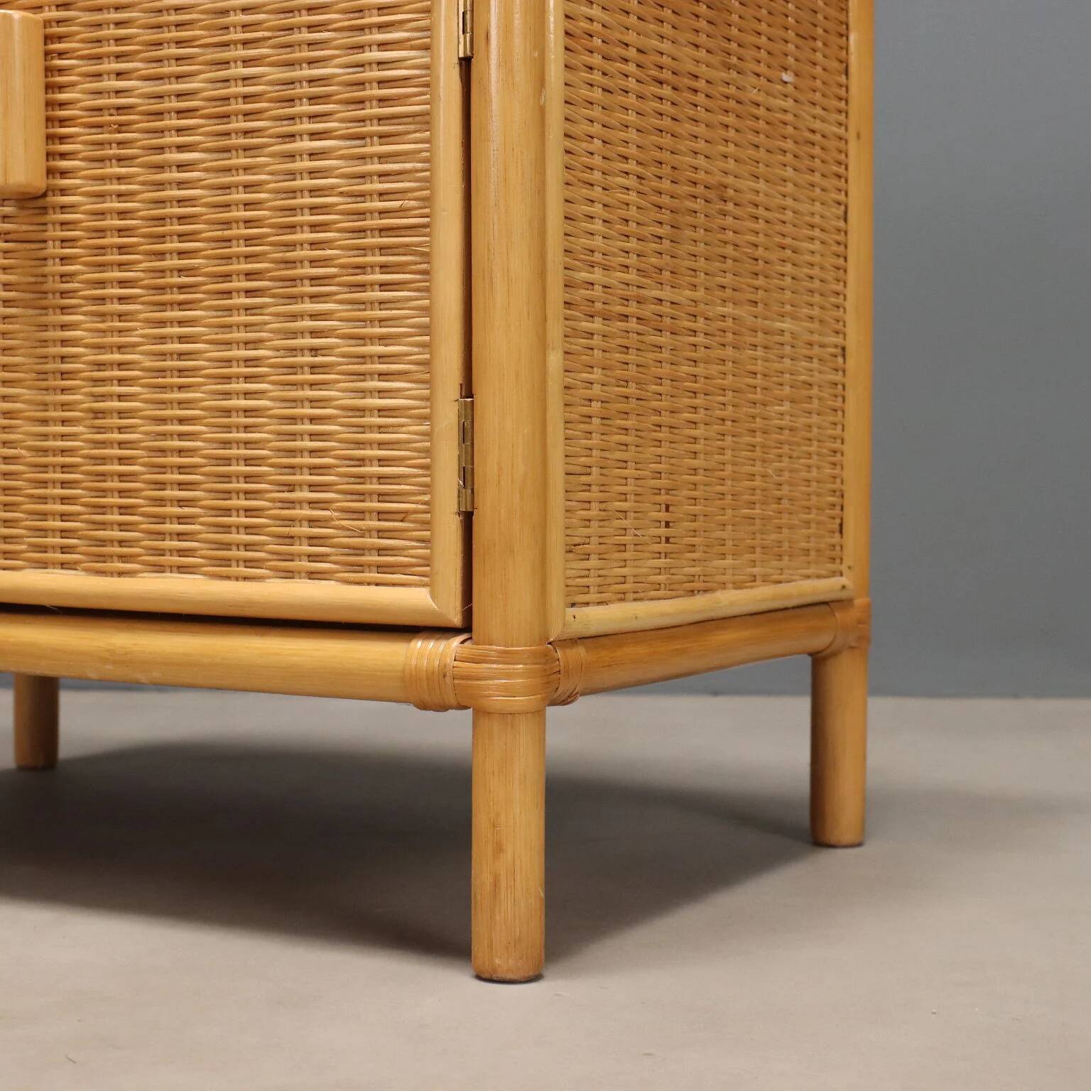 Pair of woven wicker bedside tables from the 1980s.