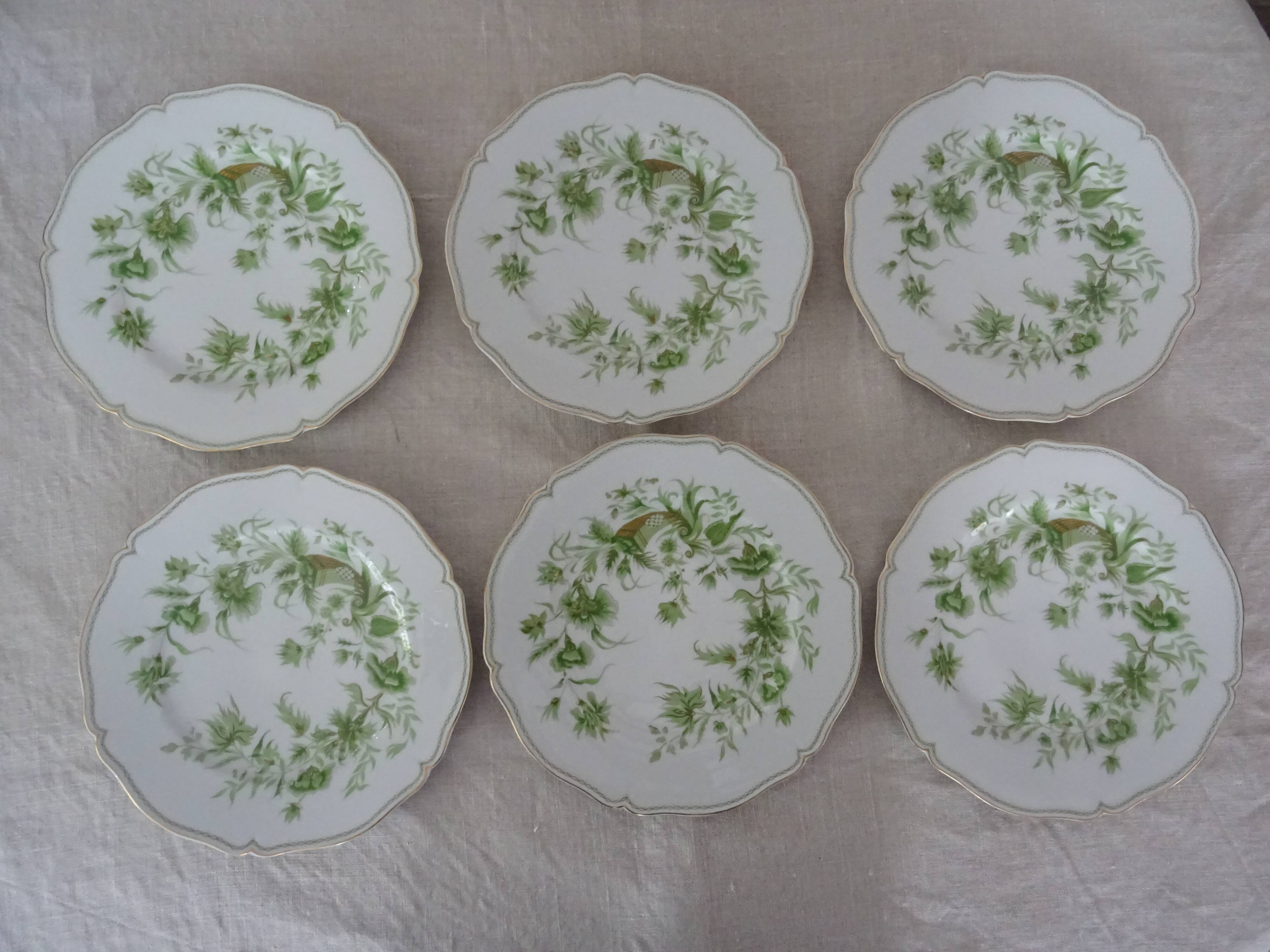 6 flat plates and 1 round dish haviland limoges with green and gold horn