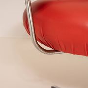 Vintage orange faux leather chair