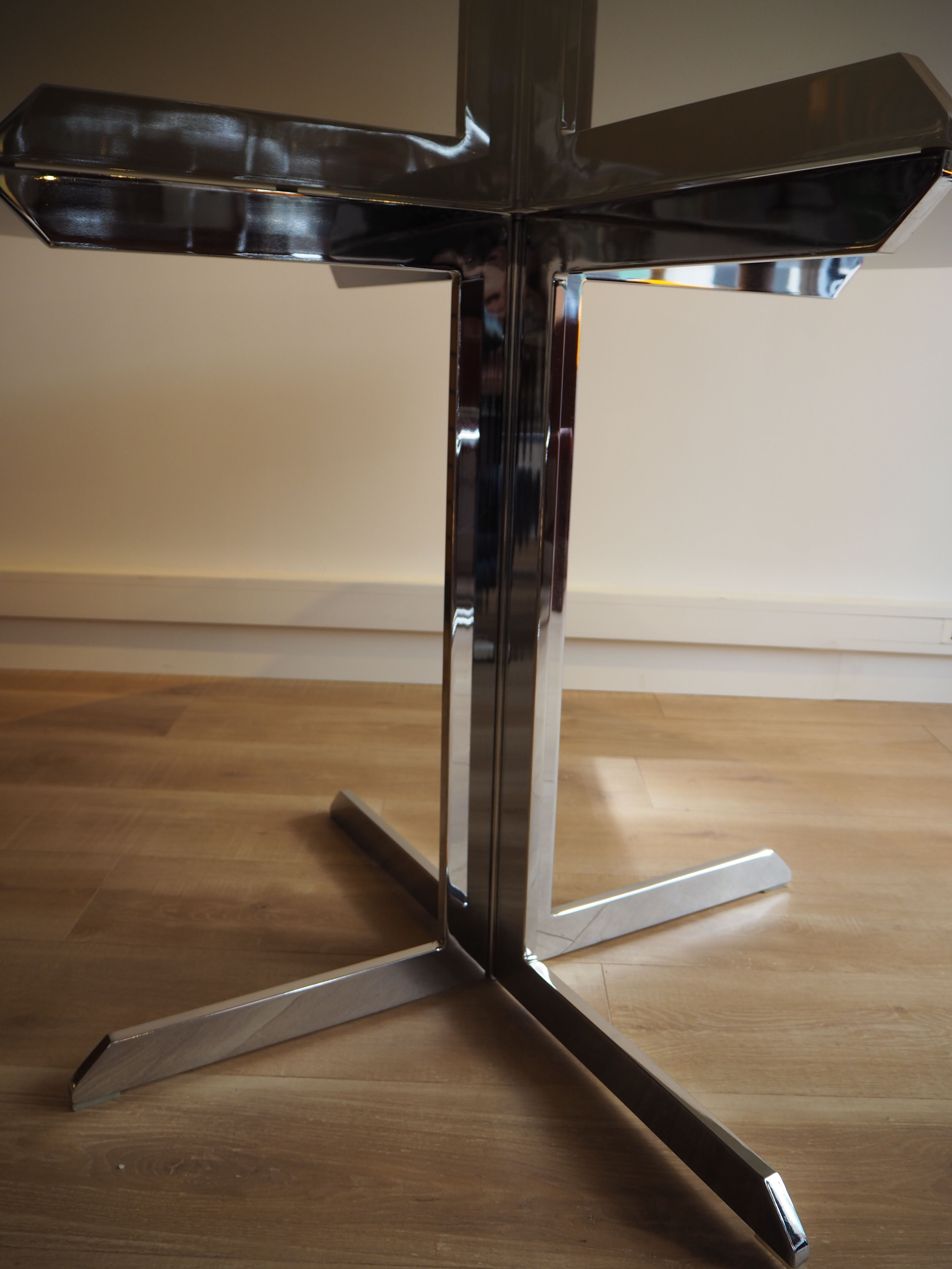 Smoked glass round dining table