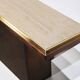 Minimalist console in travertine and patinated metal — 1970s