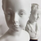 Porcelain biscuit busts by Camille Tharaud, children Louise and Alexandre Brongniart after Houdon