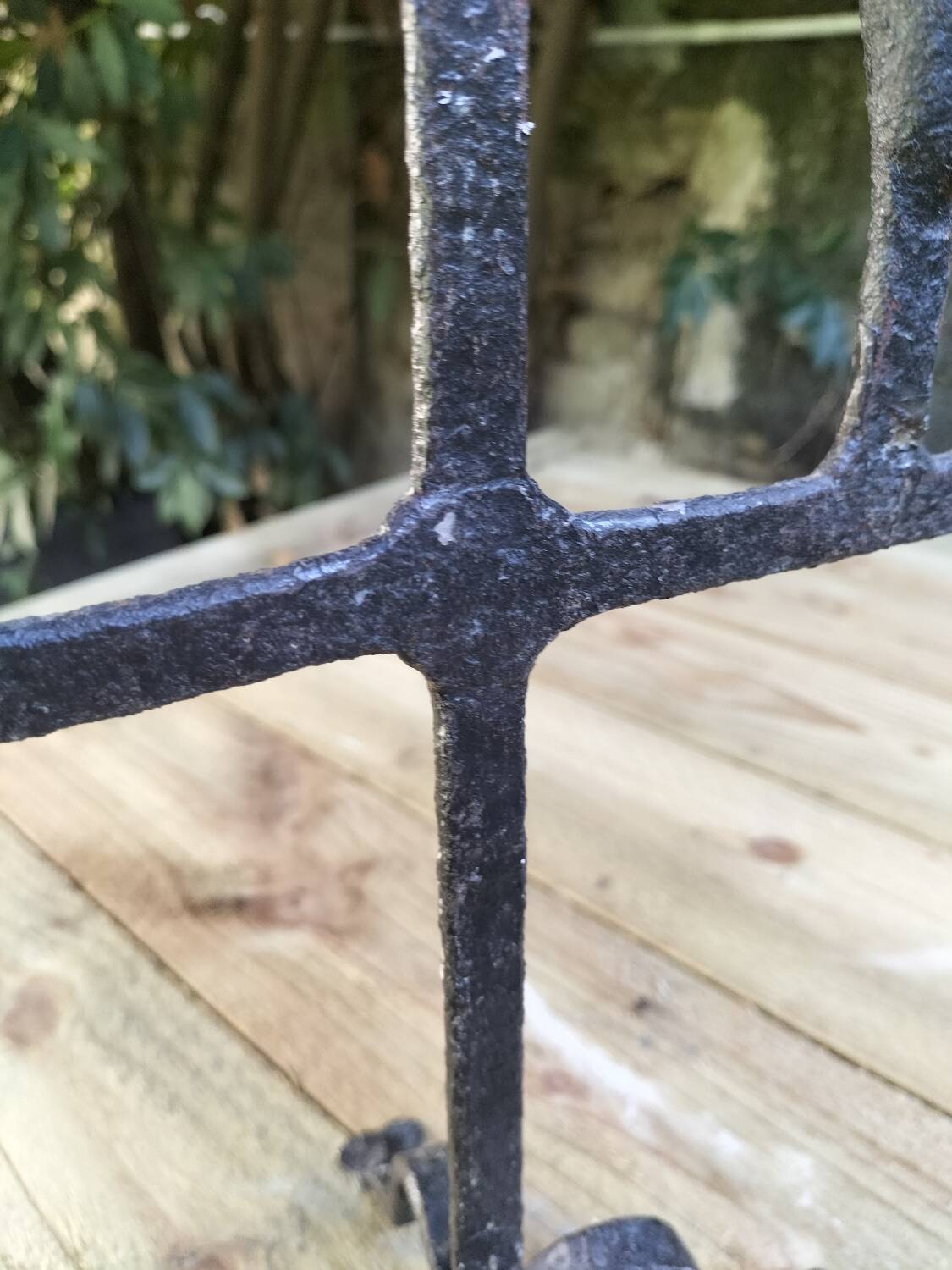 Brutalized wrought iron candle holder