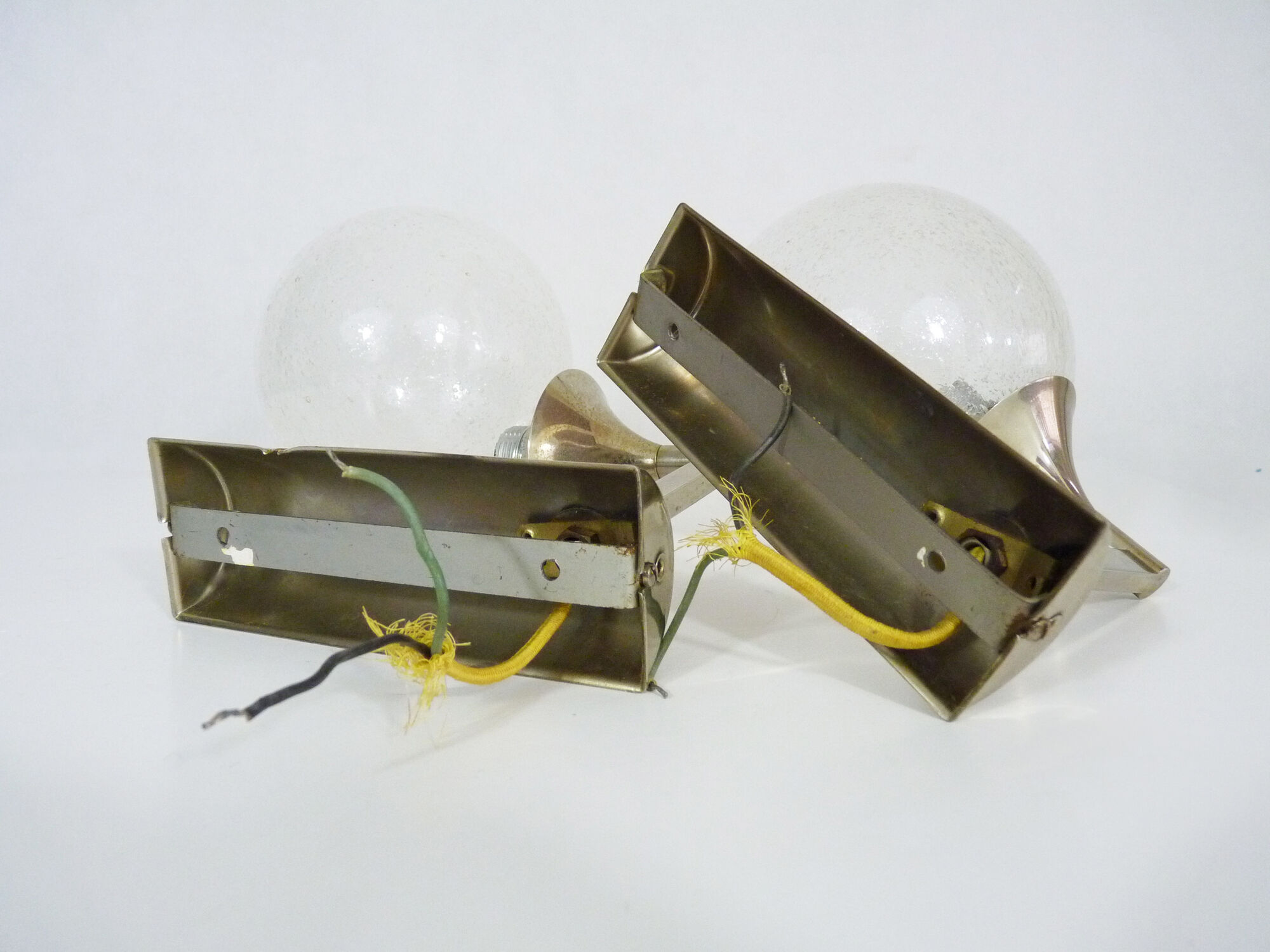 Pair of chrome metal wall sconces and blown glass