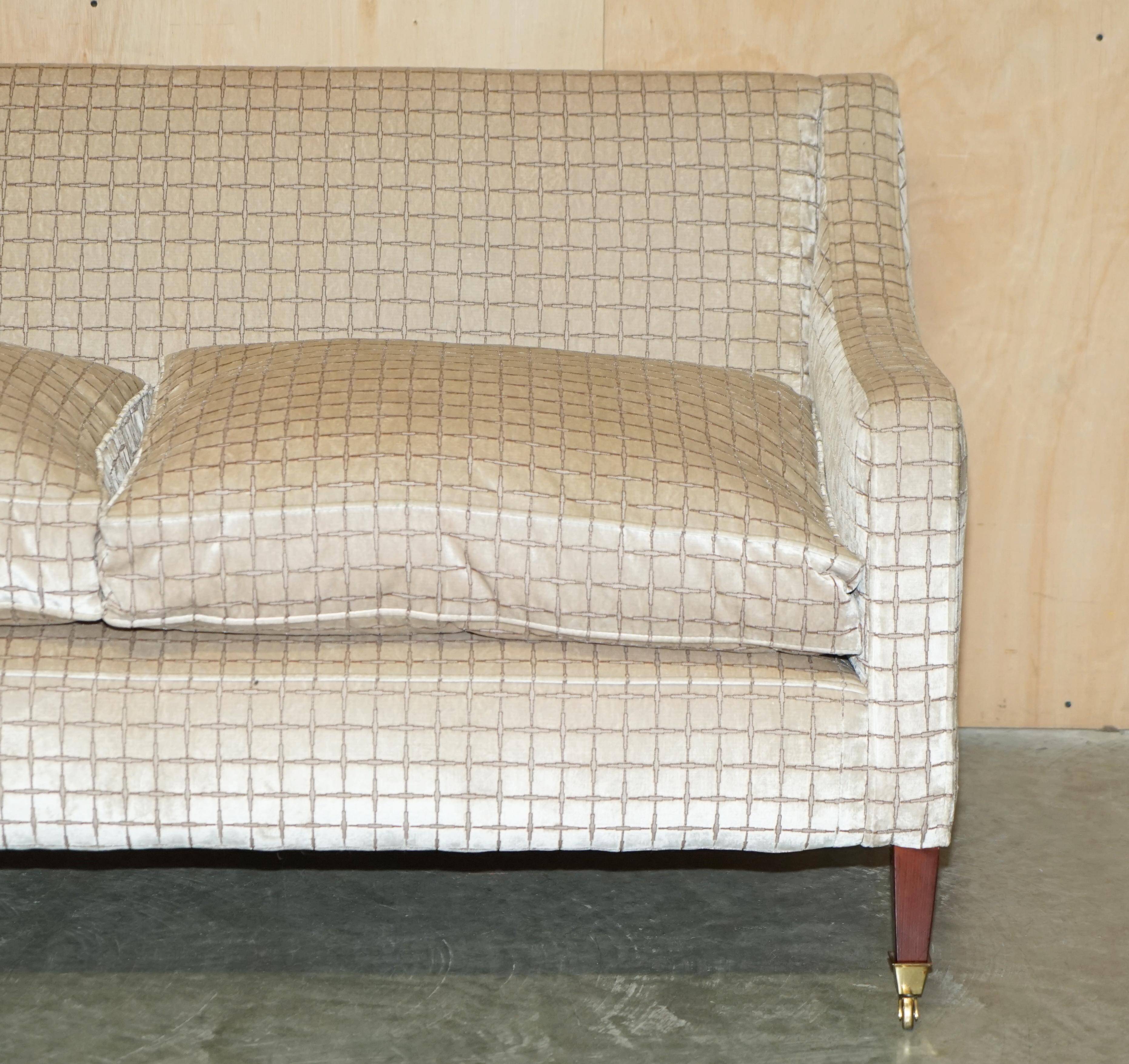 Fabric sofa and footstool, handmade in England.