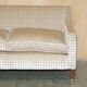 Fabric sofa and footstool, handmade in England.
