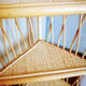 Corner wicker shelf