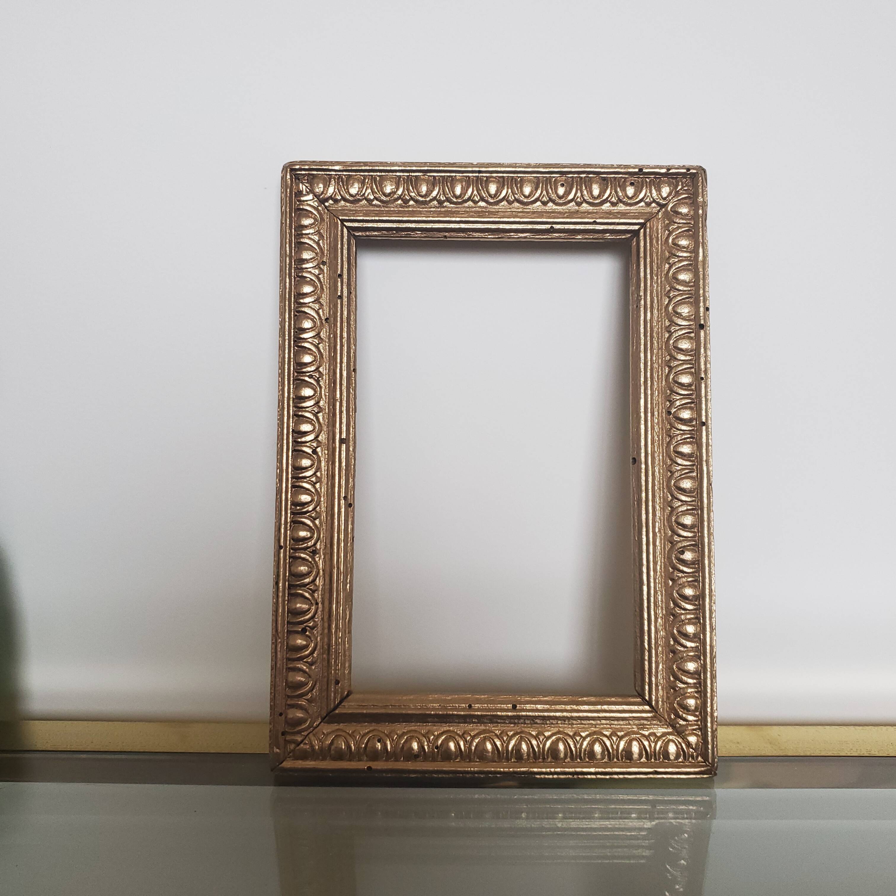 Small old gilded wooden frame