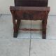 Vintage magazine rack in oak and antique leather