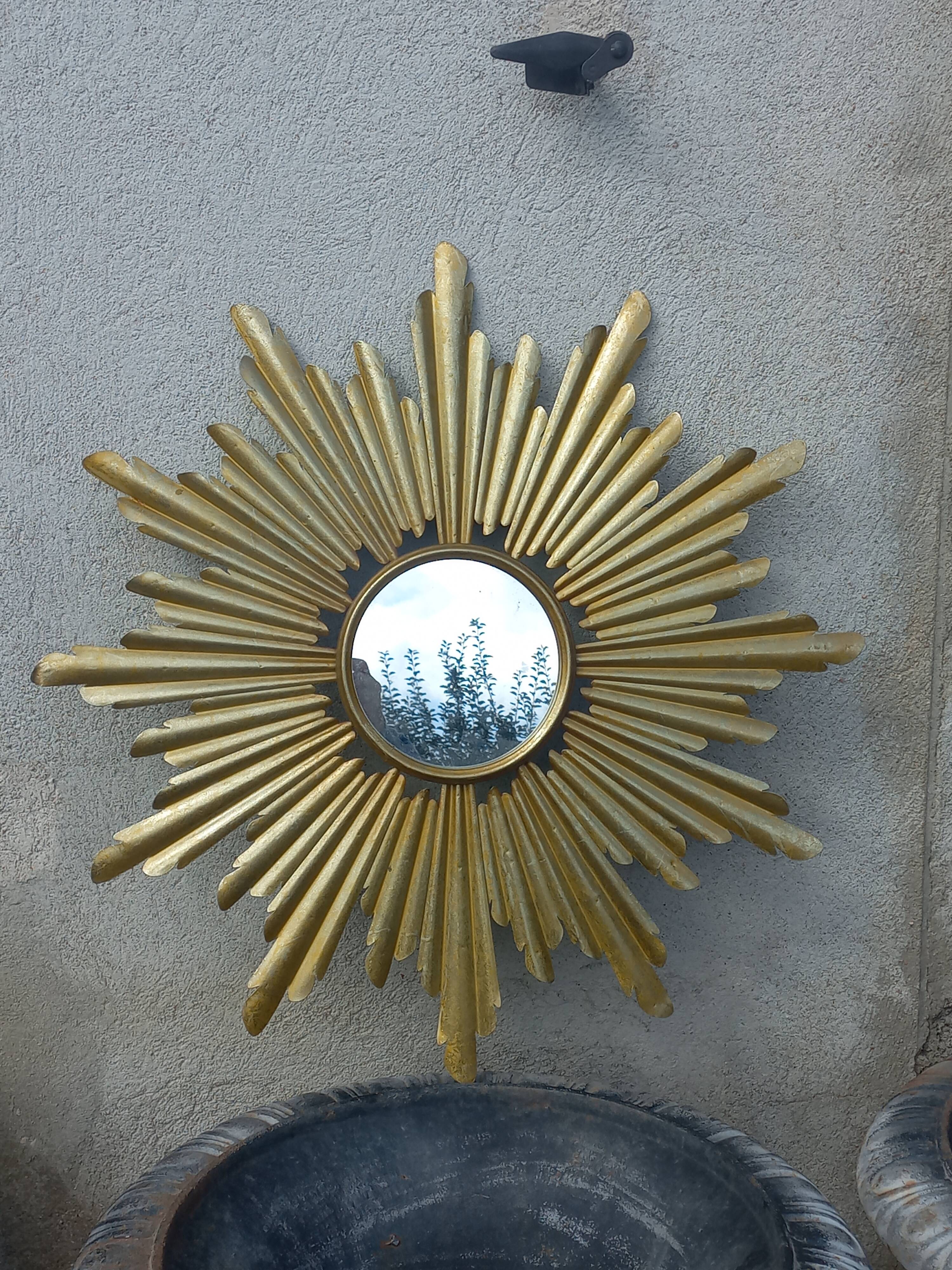 Gold metal sun mirror