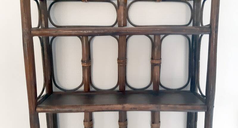 Rattan wall shelf from the 70s.