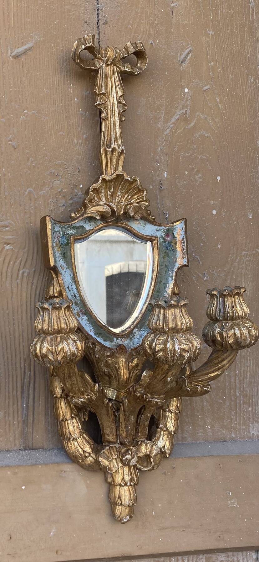 Pair of carved wood sconces