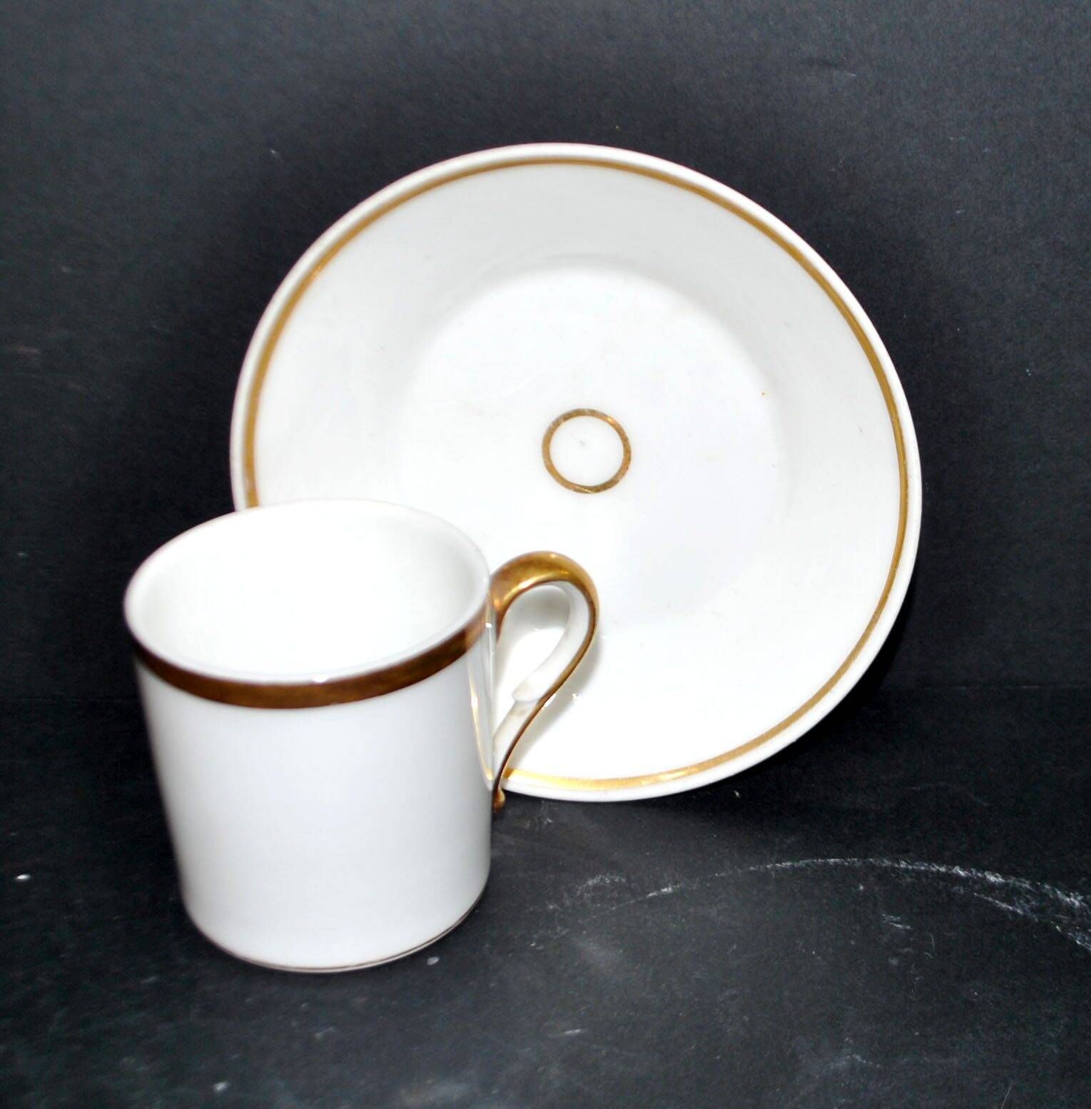 Charles Hebert Rouen porcelain – Antique litron coffee cup with gold trim.