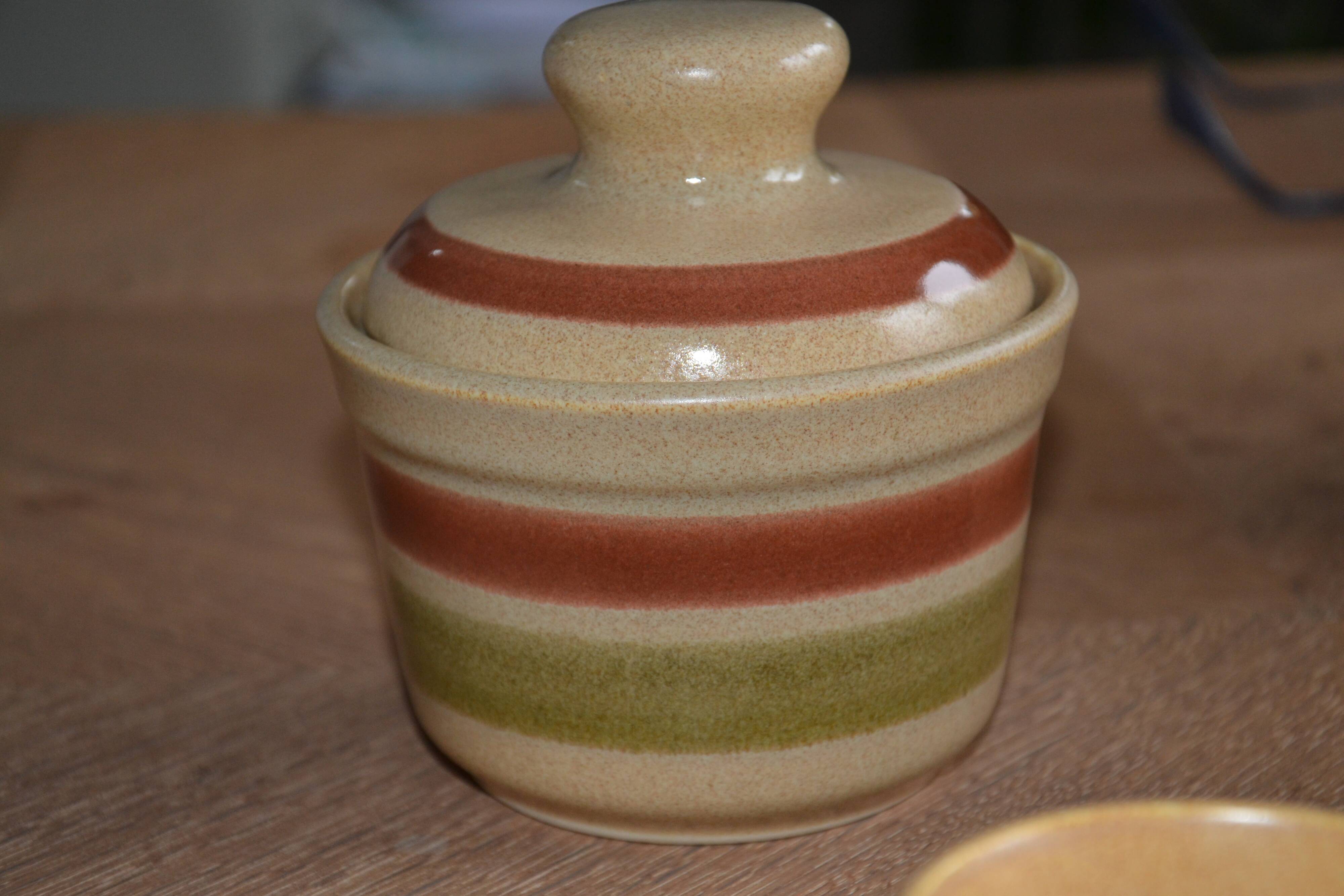 11 St Amand glazed stoneware cups and saucers/sugar bowl/milk jug