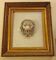 Antique large gilded frame with lion head ornament on plexiglass