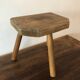 Wooden tripod stool