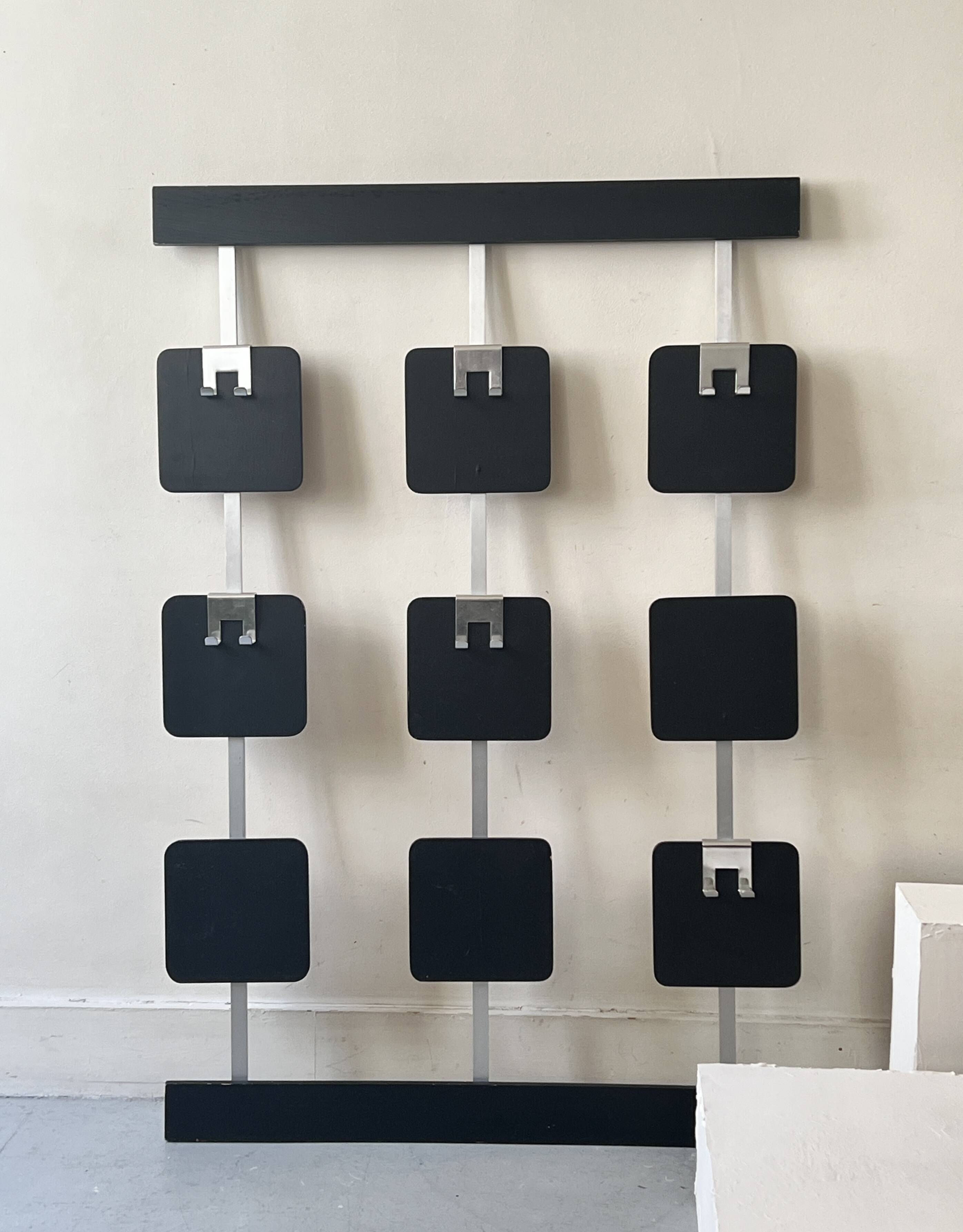 Large modernist wall coat rack in wood and metal, 1970s design.