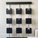 Large modernist wall coat rack in wood and metal, 1970s design.