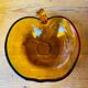 Salad bowl and apple raviers in amber glass 70 years