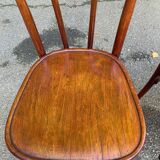 2 curved solid wood bistro chairs in Bordeaux.