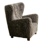 Fauteuil en peau de mouton danois du milieu du siècle par Fritz Hansen, années 1940.