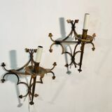 Pair of gilded metal sconces decorated with clovers.