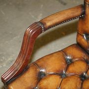Restored leather captain's Chesterfield chair