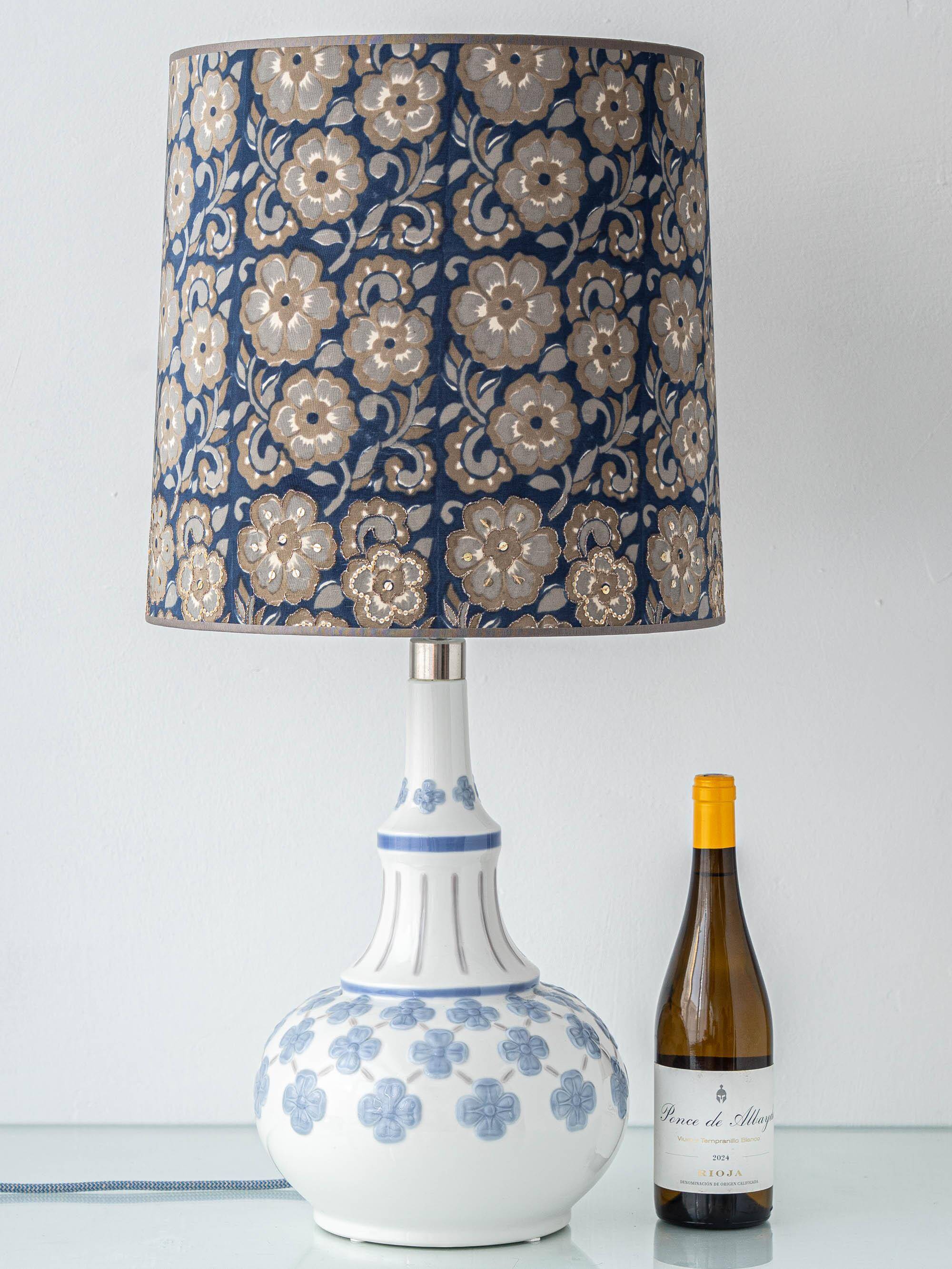 Blue and white porcelain table lamp by Lladró with floral shade in new silk.