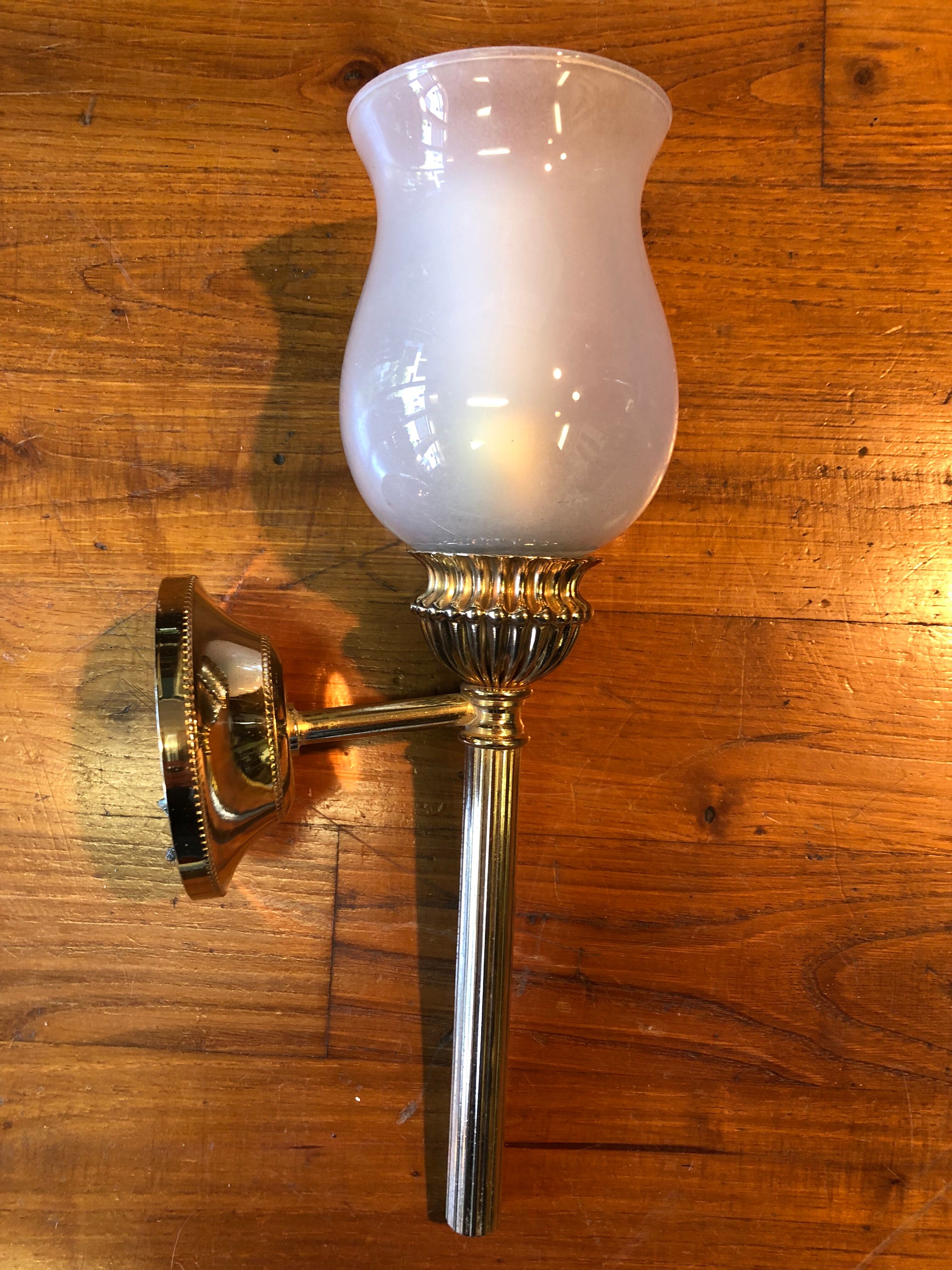 Pair of brass and opaline wall lamps
