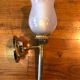 Pair of brass and opaline wall lamps